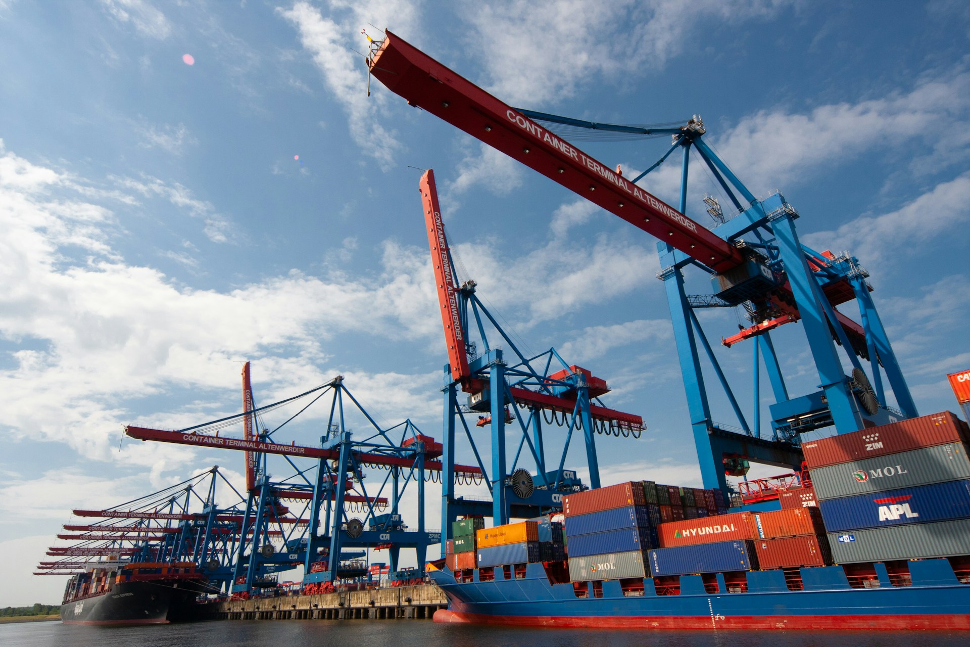 Modern industrial facility with logistics infrastructure and manufacturing operations, representing industrial and logistics real estate solutions